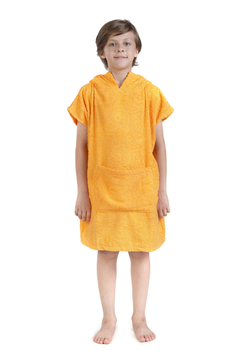 Child wearing a yellow towel dress on a white background